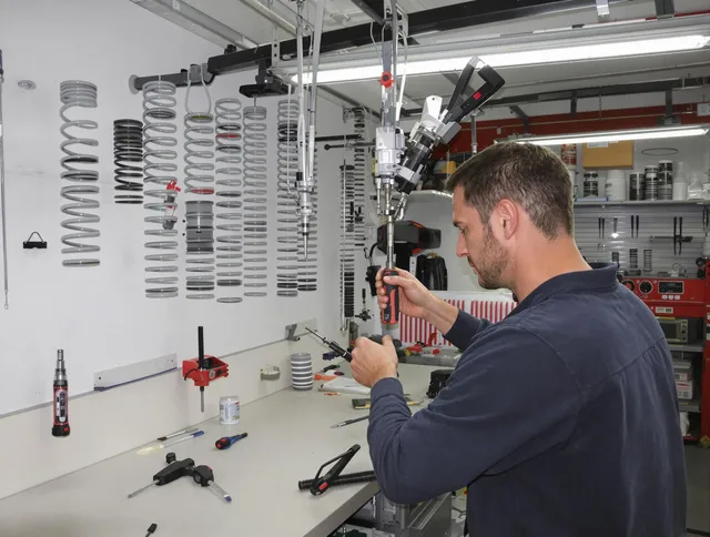 Derby Garage Door Repair safety certified technician performing precision spring replacement in Derby