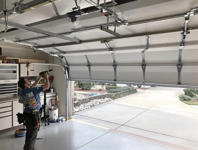 Garage door track repair service by Derby Garage Door Repair in Derby